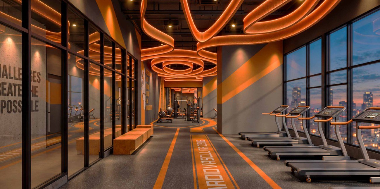 MABA Suitez fitness studio with treadmills and city views